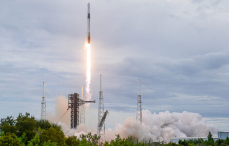 Elon Musk's SpaceX reports a profit and he hints at a possible merger with Tesla